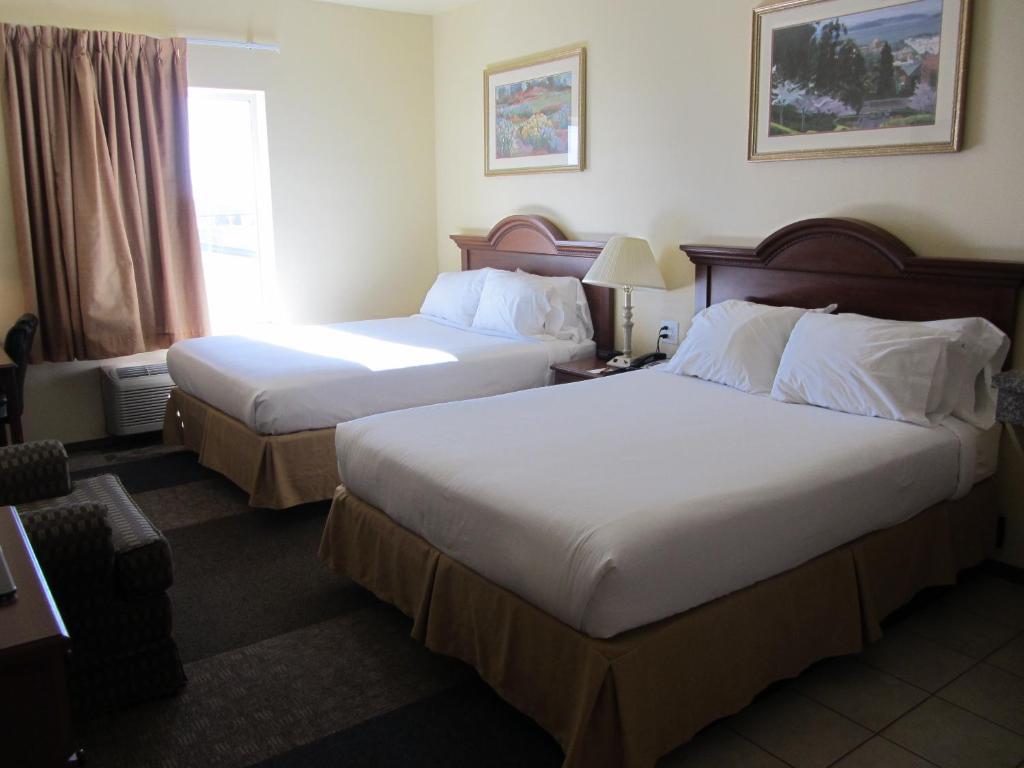 Reddy Hotel Plainview Quarto foto